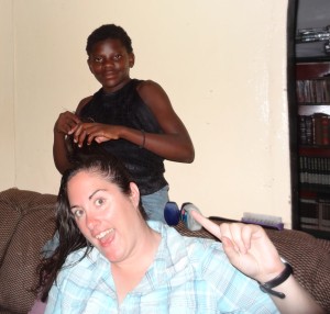 Naomi giving me the salon treatment at Oz Kids Orphanage.